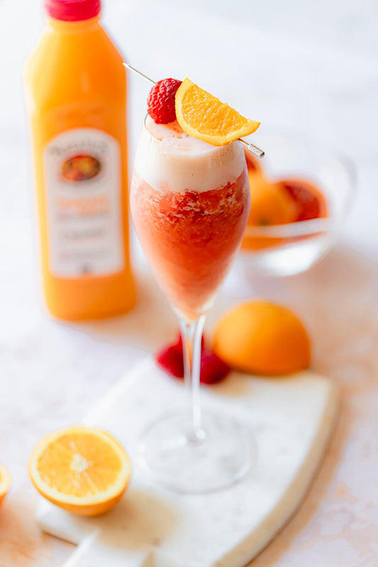 Tangerine Raspberry Fizz Mimosa Mocktail